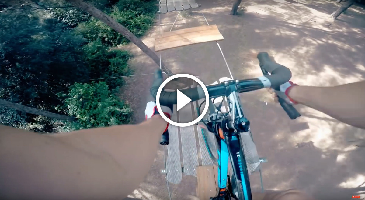 Watch Riding an Elevated Ropes Course on a Road Bike Singletracks