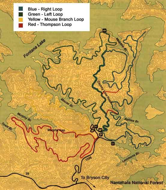 Topographic map of the Nantahala National Forest, highlighting four trail loops: blue for the Right Loop, green for the Left Loop, yellow for the Mouse Branch Loop, and red for the Thompson Loop. Features include Fontana Lake and surrounding geographic landmarks. Tsali Left Loop mountain bike trail.