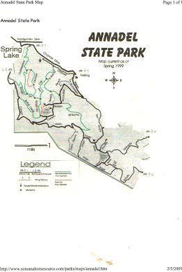 A map of Annadel State Park, featuring trails, park boundaries, and notable landmarks, with a section labeled "Spring Lake." The map includes a legend for navigation and is marked with various color-coded paths. Annadel State Park mountain bike trail.