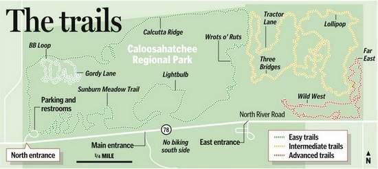 Map of the trails at Caloosahatchee Regional Park, showing various trail names and difficulty levels (easy, intermediate, advanced). Key features include the main entrance, north entrance, parking, restrooms, and specific trails like Gordy Lane and Wild West. The map also indicates areas where biking is not permitted. Caloosahatchee Regional Park mountain bike trail.