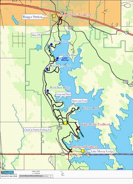 Map of the area around Lake Murray, showing hiking trails, points of interest, and key locations such as the Ranger Station and trailheads. The map includes marked routes and body of water features, with labeled trails and bridges. Lake Murray State Park mountain bike trail.