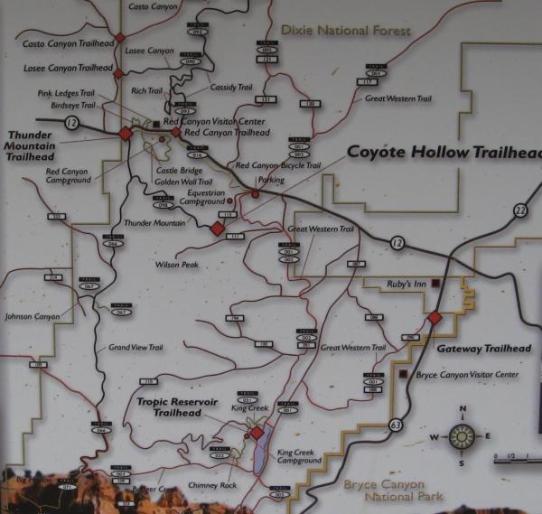 Map showing trails and trailheads in the Dixie National Forest and surrounding areas, including Thunder Mountain Trailhead, Coyote Hollow Trailhead, Ruby's Inn, and Tropic Reservoir Trailhead, with marked routes and landmarks. Thunder Mountain mountain bike trail.
