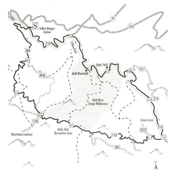 Map of the Bald River Gorge Wilderness area, highlighting key locations such as the Tellico Ranger Station, various waterfalls (Bald River Falls and Baby Falls), and recreational areas including Holly Flats. The map includes trail numbers and geographical features within the region. Upper Tellico mountain bike trail.