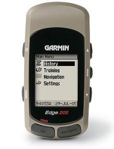 Image of a Garmin Edge 205 cycling computer, displaying the main menu with options for history, training, navigation, and settings. The device is primarily black with a gray casing and features several buttons on the sides.
