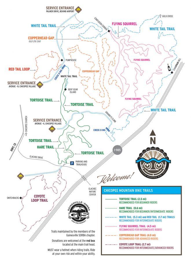 Map of the Chicopee Mountain Bike Trails, detailing various trails such as the Tortoise Trail, Hare Trail, White Tail Trail, and others. The map includes service entrance points, trail lengths, recommended skill levels for riders, and important notes about safety and maintenance by the Gainesville SORBA chapter. The directions and landmarks are clearly marked, with an orientation indicator and a welcoming message for visitors. Chicopee Woods mountain bike trail.