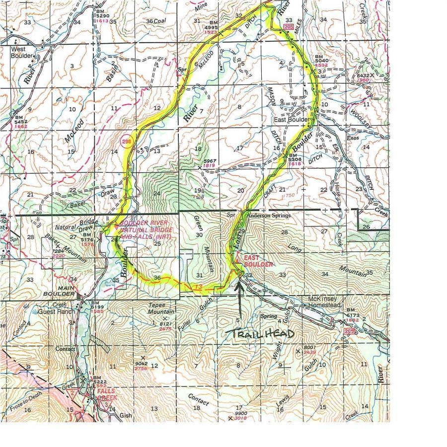 A topographic map showing the Boulder River area, including trails, natural features, and landmarks such as East Boulder and the Boulder River Natural Bridge. The highlighted route in yellow indicates a specific trail path, with markings for various points of interest and elevation contours. Teepee Mt. Saddle / Natural Bridge mountain bike trail.