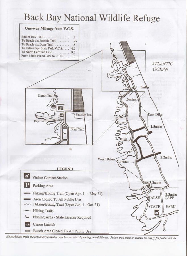 Map of Back Bay National Wildlife Refuge, detailing hiking and biking trails, fishing areas, and points of interest. Includes mileage from the Visitor Contact Station to various locations, a legend outlining trail accessibility and usage, and the surrounding Atlantic Ocean. False Cape State Park (back Bay Wildlife Refuge) mountain bike trail.