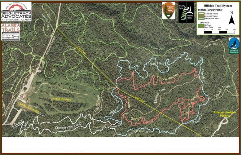 Map of the Hillside Trail System in Anchorage, Alaska, showing various trails including singletrack and other designated paths. The map includes labeled trails in red, blue, and green, a legend indicating trail types, and nearby landmarks such as the Hilltop Ski Area and Prospect Heights Parking. Sta Trails mountain bike trail.
