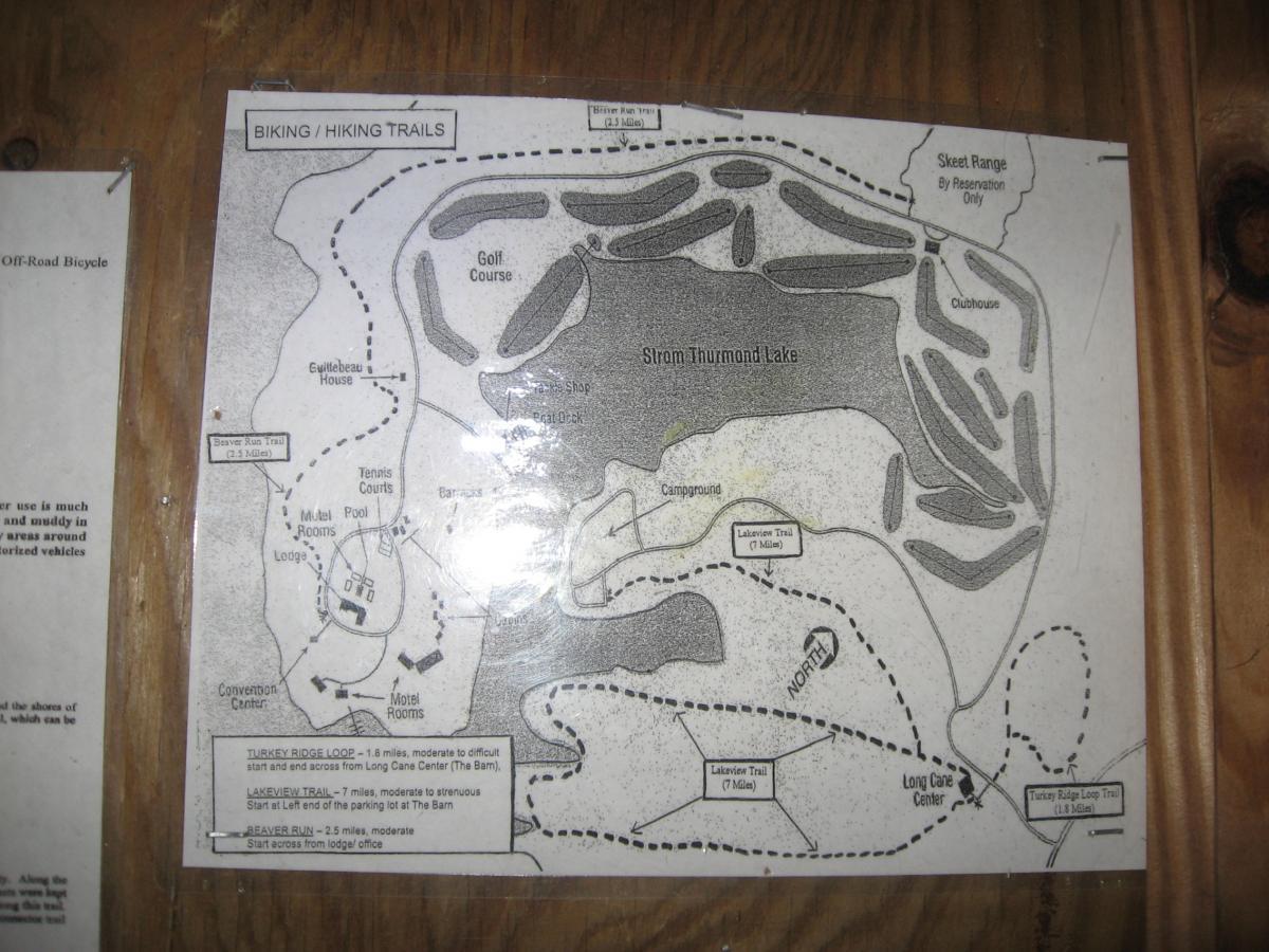 Map of biking and hiking trails around Strom Thurmond Lake, showing various routes including the Lakeview Trail and Turkey Ridge Loop, with markers for points of interest like the campground, golf course, and clubhouse. Hickory Knob State Park mountain bike trail.