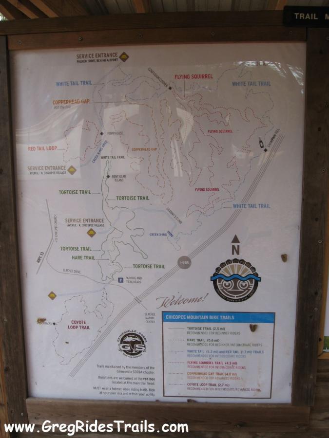Map of the Chicoppee Mountain Bike Trails, showing various trail options including Tortoise Trail, Flying Squirrel, White Tail Trail, and others. The map includes service entrances, recommended skill levels for each trail, and additional information for cyclists. Chicopee Woods mountain bike trail.