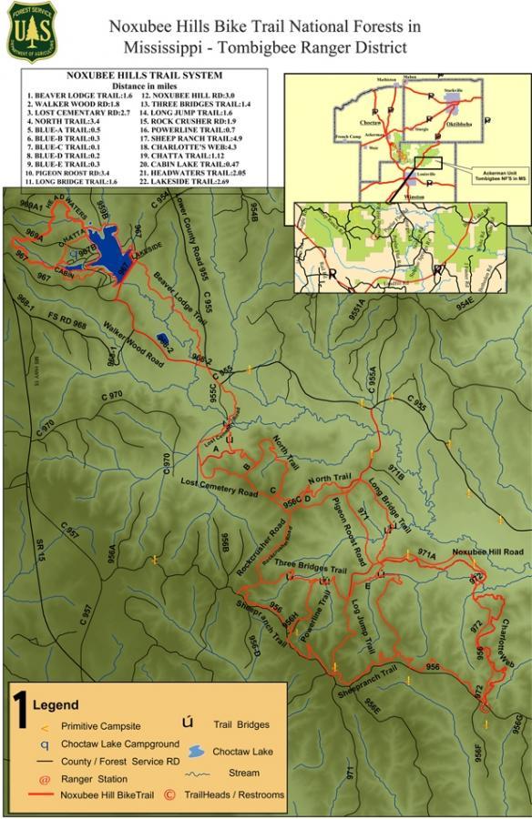 Map of the Noxubee Hills Bike Trail in the Tombigbee Ranger District, Mississippi. It shows bike trails with distances, trailheads, campsites, and other features. The map includes a legend for better navigation and orientation. Noxubee Crest mountain bike trail.