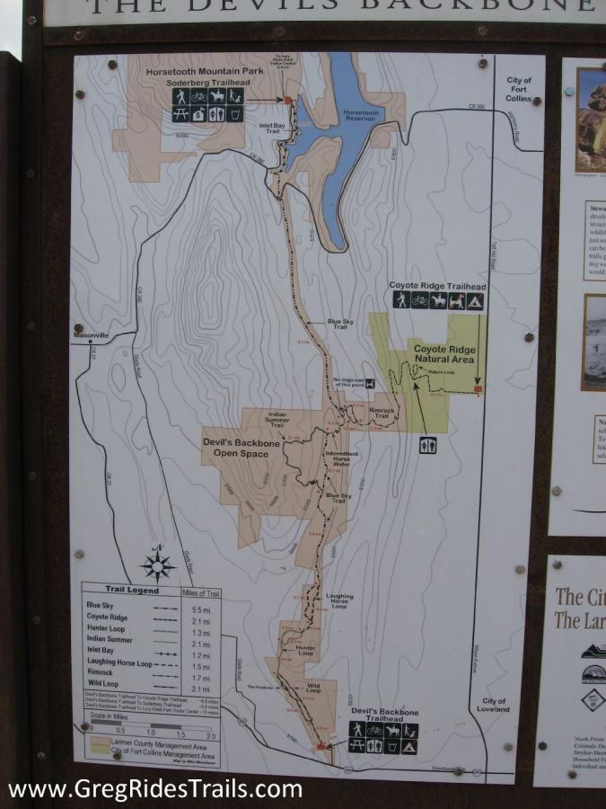 A trail map of the Devil's Backbone Open Space displaying various hiking trails, including the Blue Sky Trail, Coyote Ridge, and others. Key features include trail lengths, trailhead locations, and nearby landmarks such as Horsetooth Mountain Park and the City of Fort Collins. The map includes a legend indicating trail types and nearby facilities. Devil's Backbone mountain bike trail.