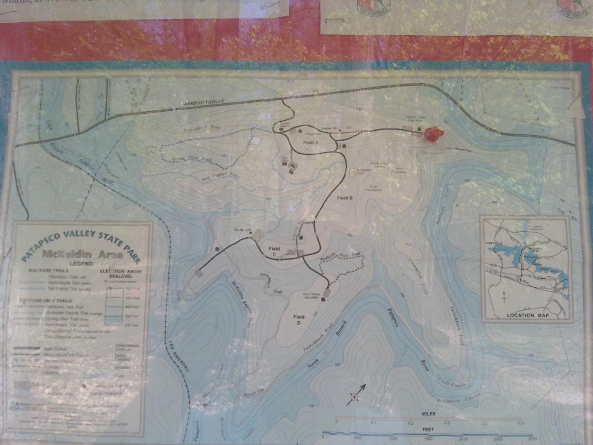 Map of Patapsco Valley State Park's Metcalf Area, illustrating trails, topography, and nearby features. The legend indicates wildlife trails, elevation, and distance measurements. A small inset map shows the surrounding region. Patapsco Valley State Park (mckeldin Area) mountain bike trail.
