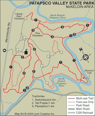 Map of Patapsco Valley State Park, McKeldin Area, showing various trails including multi-use and foot-only paths, trail distances, and landmarks such as the Liberty Dam Overlook and Pine Plantation. The map also features a compass rose and nearby roadways. Patapsco Valley State Park (mckeldin Area) mountain bike trail.