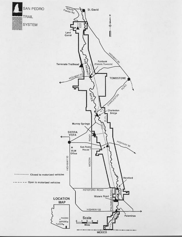 A black and white map of the San Pedro Trail System, highlighting various locations including towns such as Tombstone, Sierra Vista, and Palominas. The map indicates routes open to motorized vehicles and those that are not, with highways and trails marked. The compass rose in the corner shows north, and a scale is provided at the bottom to indicate distances. San Pedro Riparian National Conservation Area mountain bike trail.