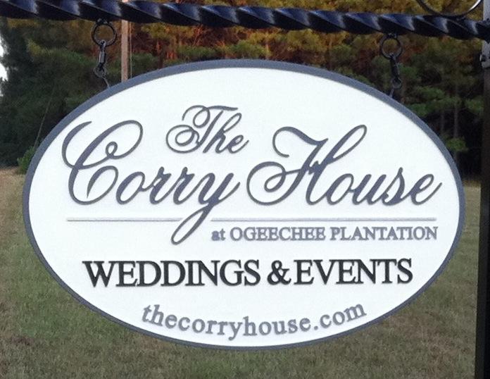 Sign for The Corry House at Ogechee Plantation, indicating it is available for weddings and events. The sign features an elegant design with the website displayed at the bottom. Corry House Trails mountain bike trail.