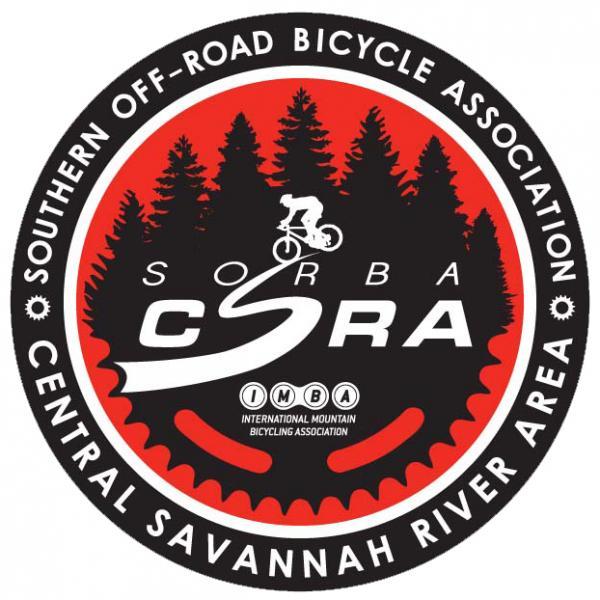 Circular logo for the Southern Off-Road Bicycle Association (SORBA) Central Savannah River Area (CSRA). The design features a silhouette of a cyclist riding through stylized trees, with a red and black color scheme. The text includes "Southern Off-Road Bicycle Association," "SORBA," "CSRA," and "International Mountain Bicycling Association."