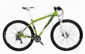 Airborne Goblin: A green mountain bike with a lightweight frame, front suspension, disc brakes, and knobby tires, positioned against a white background.
