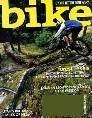 * Bike: A mountain biker navigating a rugged trail through a forest, surrounded by trees and fallen logs. The image features the cover of a biking magazine titled "Bike," with various text elements highlighting articles about mountain biking.