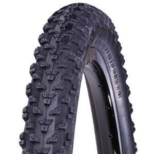 Bontrager Jones XR: Close-up image of a mountain bike tire showcasing a textured tread pattern, with a portion of the inner wheel visible. The tire is designed for traction and stability on uneven terrain.