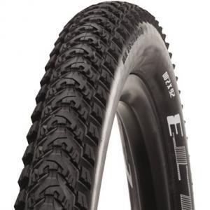 Bontrager LT3: A close-up image of a mountain bike tire, showcasing its rugged tread pattern and sidewall branding. The tire is black with defined grooves designed for traction on off-road surfaces.
