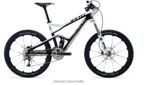 Cannondale Jekyll Ultimate: Alt tag: "A high-performance mountain bike featuring a sleek black and white frame, thick tires suitable for rugged terrain, and advanced suspension components."