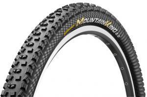 Continental Mountain King II: "Close-up image of a mountain bike tire featuring a tread pattern designed for off-road traction, with the name 'Mountain King' displayed on the sidewall."
