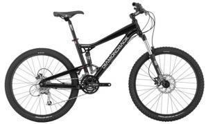 Diamondback Mission 1: A black mountain bike featuring dual suspension, wide tires, and disc brakes, positioned against a white background.