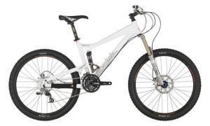 Diamondback Mission 2: A white mountain bike with wide tires, disc brakes, and a front suspension fork, positioned on a plain background.