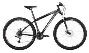 Diamondback Overdrive: A black mountain bike with disc brakes, a sturdy frame, and wide tires, designed for outdoor and off-road cycling.