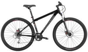 Diamondback Overdrive Pro: A black mountain bike with a sturdy frame, front suspension, and disc brakes, featuring wide tires suitable for off-road terrain.