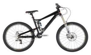 Diamondback Scapegoat: A black mountain bike with a full suspension design, featuring thick tires, disc brakes, and a sleek frame. The bike is positioned on a neutral background, highlighting its features.