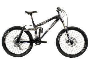 Ellsworth Rogue: A black and silver mountain bike featuring a sturdy frame, dual suspension, wide tires, and disc brakes. The bike is designed for off-road cycling and has an adjustable seat and front suspension fork.