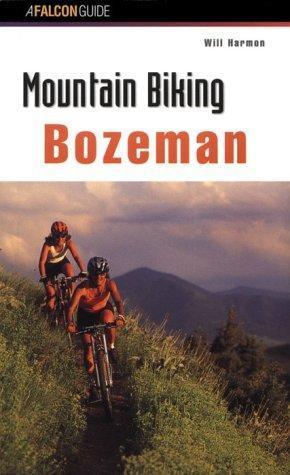 Falcon Guides Fat Trax Bozeman: Cover of the book "Mountain Biking Bozeman" by Will Harmon, featuring two mountain bikers riding on a grassy trail with a mountainous landscape in the background. The title is prominently displayed at the top.