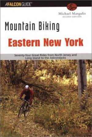Falcon Guides Mountain Biking Eastern New York: Book cover of "Mountain Biking Eastern New York" by Michael Margulis, showcasing a mountain biker riding through a wooded trail. The title and author