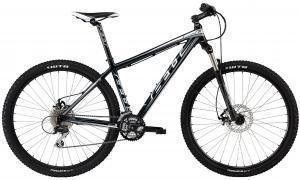 Felt Nine Trail: Mountain bike with a sleek black frame, disc brakes, and wide tires, designed for off-road cycling.