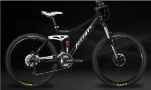 Fezzari Alta Peak: A black and white mountain bike with a sleek design, featuring large tires and a lightweight frame, set against a dark background.