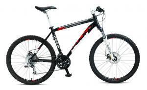 Fuji Nevada 1.0: A black and red mountain bike with a sturdy frame, front suspension, and disc brakes, positioned on a white background.