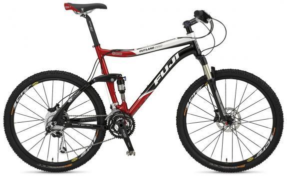Fuji Outland Pro: A red and black mountain bike with a lightweight frame, dual suspension, and wide tires, featuring disc brakes and a Shimano gear system. The bike is designed for off-road cycling and includes a comfortable saddle and ergonomic handlebars.