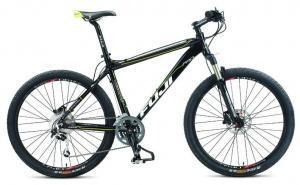 Fuji Tahoe Pro: Mountain bike with a black frame, featuring yellow accents, wide tires, and disc brakes.