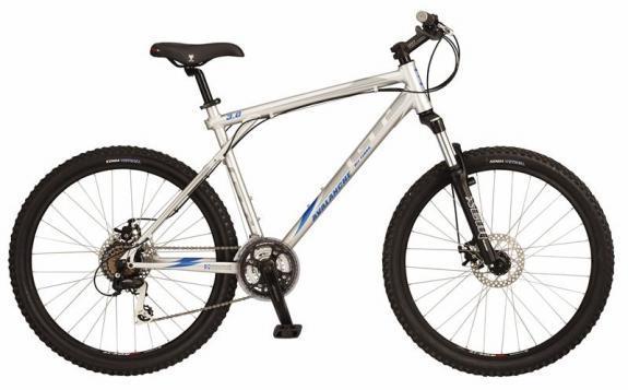 GT Avalanche: A silver mountain bike with a lightweight frame, featuring wide tires, front suspension, and disc brakes. The bike has a modern design with blue accents and is positioned upright against a neutral background.
