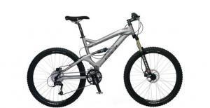 GT Force: A silver mountain bike with thick tires, a dual suspension system, and a sleek frame design.