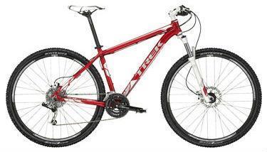 Gary Fisher Cobia: A red Trek mountain bike featuring a lightweight aluminum frame, front suspension, and knobby tires suitable for off-road terrain.