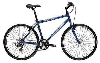 Gary Fisher Mako: A blue mountain bike with a sturdy frame, featuring dual suspension, thick tires, and a black saddle. The bike has multiple gears and a handlebar with grips for improved control, positioned on a white background.