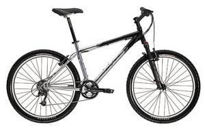 Gary Fisher Marlin: A black and silver mountain bike featuring wide tires, a sturdy frame, and a comfortable seat, positioned on a white background.