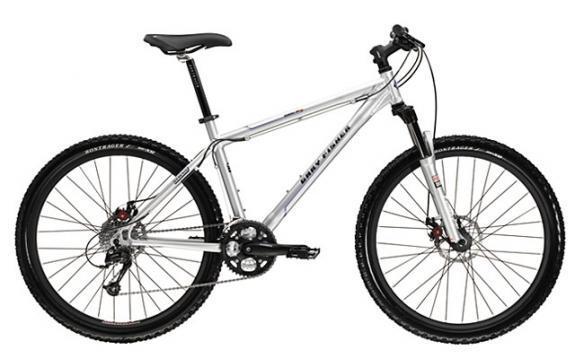 Gary Fisher Marlin Disc: A silver mountain bike with black tires and disc brakes, featuring a lightweight frame, adjustable seat, and geared drivetrain, positioned on a white background.