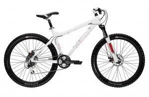 Gary Fisher Mullet: A sleek white mountain bike with a sturdy frame, featuring thick tires and disc brakes, positioned against a plain background.