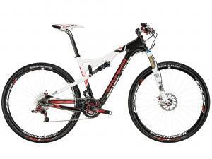 Gary Fisher Superfly 100: A high-performance mountain bike featuring a sleek white and black frame, equipped with front suspension and disc brakes, and fitted with smooth, durable tires designed for off-road riding.