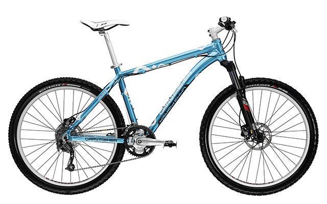 Gary Fisher Tassajara: A blue mountain bike with a sleek frame, featuring front suspension and disc brakes. The bike has wide tires designed for off-road terrain, a white saddle, and is positioned on a plain white background.