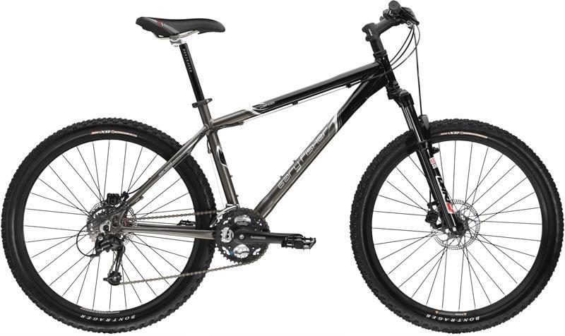 Gary Fisher Wahoo: A modern mountain bike with a black and silver frame, featuring front suspension, knobby tires, and a sleek design. The bike is shown from the side, highlighting its sturdy build and gear system.